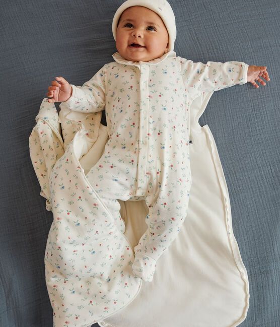 images of baby, girl, boy, and woman on a yellow curtain background