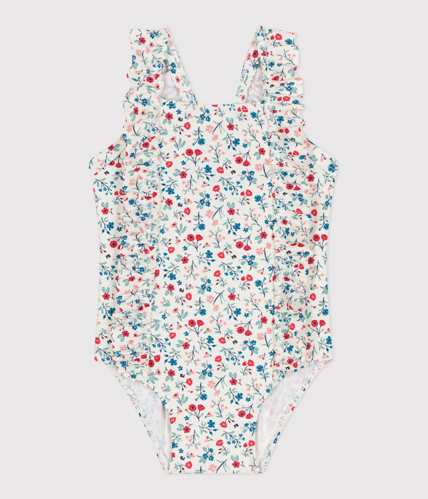 images of baby, girl, boy, and woman on a yellow curtain background